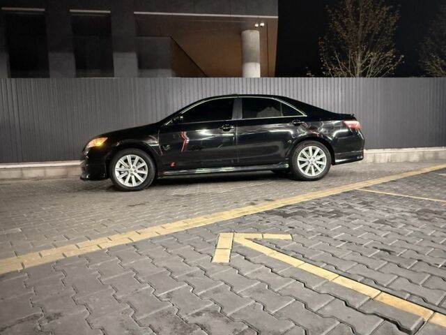 Черный Тойота Камри, объемом двигателя 2.4 л и пробегом 251 тыс. км за 11990 $, фото 23 на Automoto.ua