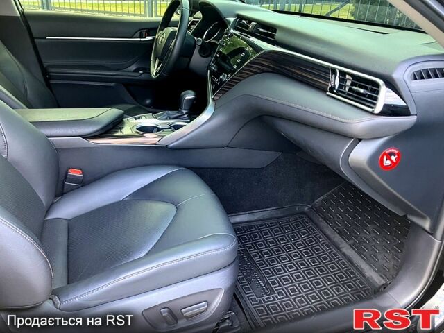 Черный Тойота Камри, объемом двигателя 2.5 л и пробегом 199 тыс. км за 22500 $, фото 7 на Automoto.ua