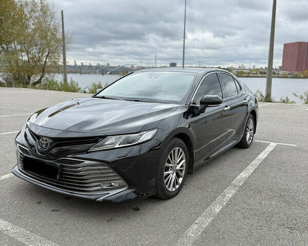 Черный Тойота Камри, объемом двигателя 2.49 л и пробегом 180 тыс. км за 22000 $, фото 1 на Automoto.ua