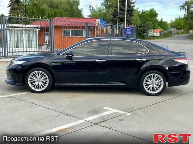 Черный Тойота Камри, объемом двигателя 2.5 л и пробегом 199 тыс. км за 22500 $, фото 2 на Automoto.ua