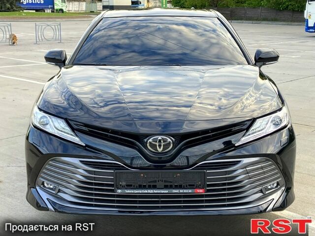 Чорний Тойота Камрі, об'ємом двигуна 2.5 л та пробігом 205 тис. км за 21800 $, фото 1 на Automoto.ua