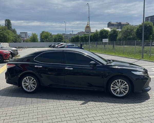 Чорний Тойота Камрі, об'ємом двигуна 2.49 л та пробігом 107 тис. км за 27000 $, фото 2 на Automoto.ua