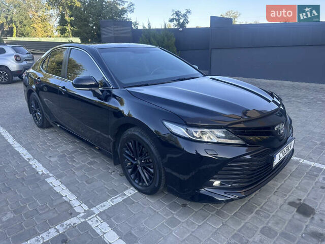 Черный Тойота Камри, объемом двигателя 2.5 л и пробегом 168 тыс. км за 20900 $, фото 1 на Automoto.ua