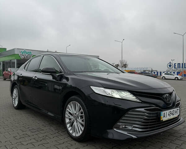 Черный Тойота Камри, объемом двигателя 2.49 л и пробегом 163 тыс. км за 22000 $, фото 1 на Automoto.ua