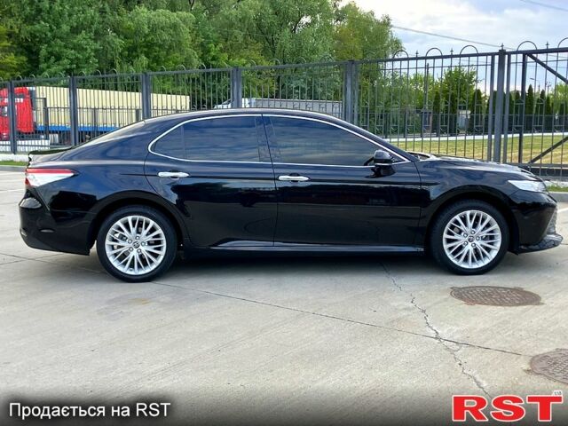 Черный Тойота Камри, объемом двигателя 2.5 л и пробегом 199 тыс. км за 22900 $, фото 2 на Automoto.ua