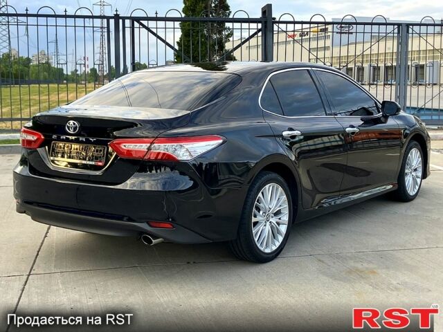 Черный Тойота Камри, объемом двигателя 2.5 л и пробегом 199 тыс. км за 22500 $, фото 4 на Automoto.ua