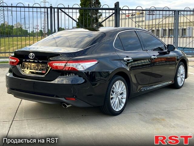 Черный Тойота Камри, объемом двигателя 2.5 л и пробегом 199 тыс. км за 22900 $, фото 4 на Automoto.ua