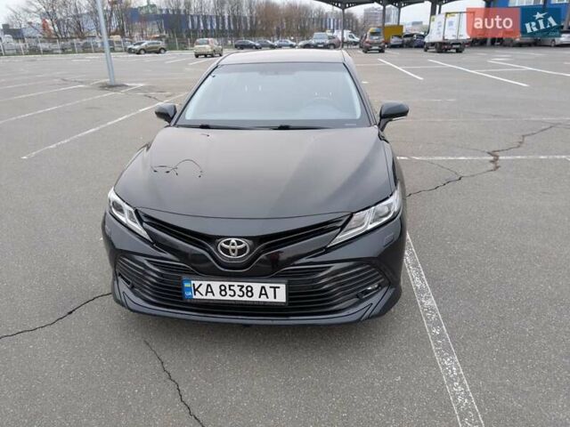 Черный Тойота Камри, объемом двигателя 2.49 л и пробегом 106 тыс. км за 20500 $, фото 1 на Automoto.ua