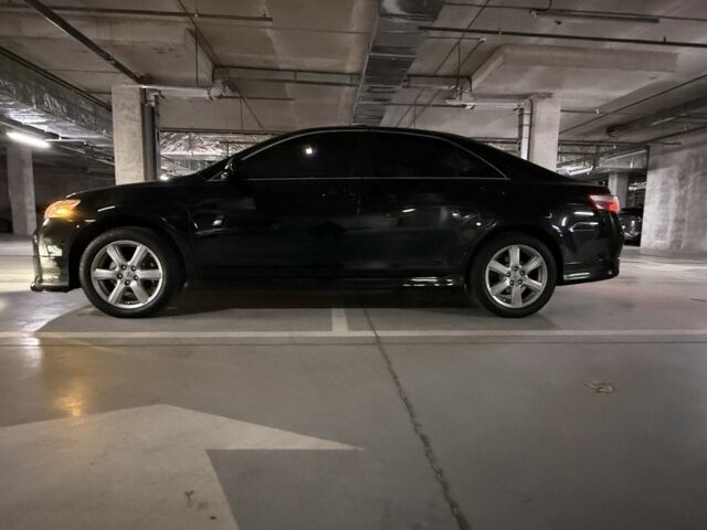 Черный Тойота Камри, объемом двигателя 2.4 л и пробегом 251 тыс. км за 11990 $, фото 1 на Automoto.ua