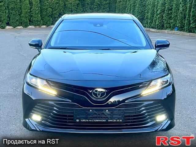 Чорний Тойота Камрі, об'ємом двигуна 2.5 л та пробігом 63 тис. км за 23100 $, фото 1 на Automoto.ua