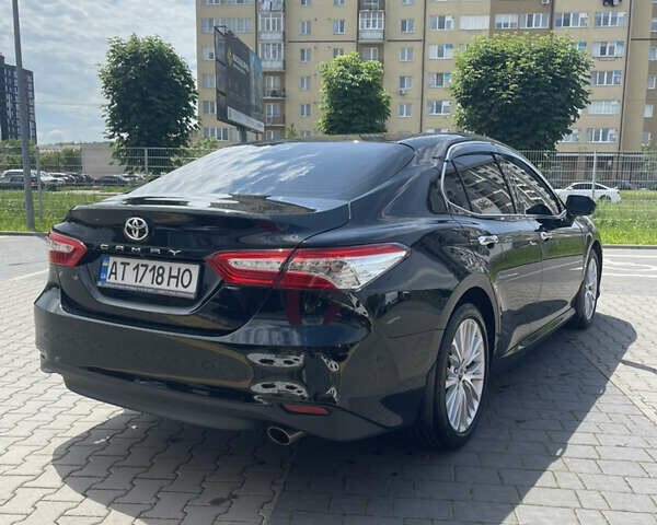 Чорний Тойота Камрі, об'ємом двигуна 2.49 л та пробігом 107 тис. км за 27000 $, фото 3 на Automoto.ua