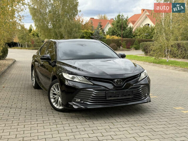 Черный Тойота Камри, объемом двигателя 2.49 л и пробегом 95 тыс. км за 24900 $, фото 1 на Automoto.ua