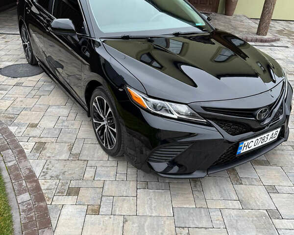 Чорний Тойота Камрі, об'ємом двигуна 2.5 л та пробігом 192 тис. км за 19500 $, фото 1 на Automoto.ua