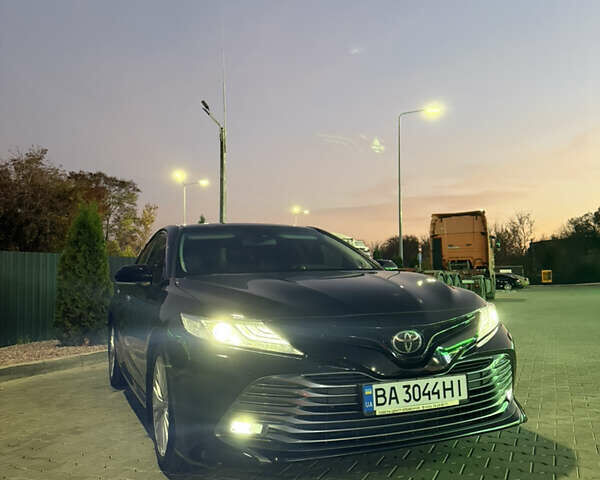 Чорний Тойота Камрі, об'ємом двигуна 2.5 л та пробігом 129 тис. км за 26000 $, фото 1 на Automoto.ua