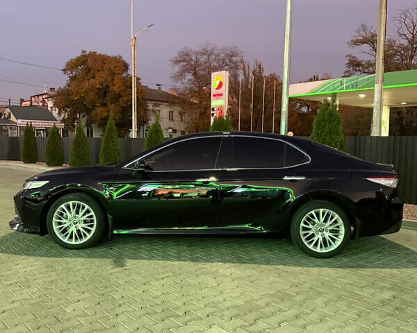 Чорний Тойота Камрі, об'ємом двигуна 2.5 л та пробігом 129 тис. км за 26000 $, фото 9 на Automoto.ua