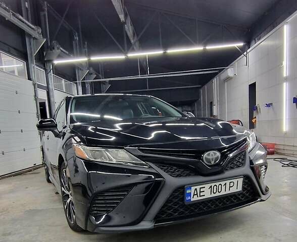 Черный Тойота Камри, объемом двигателя 2.49 л и пробегом 150 тыс. км за 21000 $, фото 1 на Automoto.ua