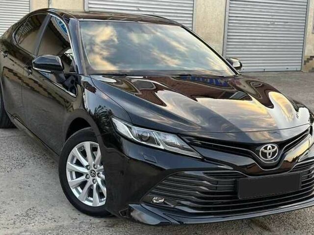 Черный Тойота Камри, объемом двигателя 2.5 л и пробегом 117 тыс. км за 17600 $, фото 1 на Automoto.ua