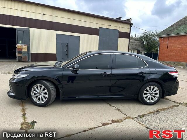 Черный Тойота Камри, объемом двигателя 2.5 л и пробегом 67 тыс. км за 24500 $, фото 1 на Automoto.ua