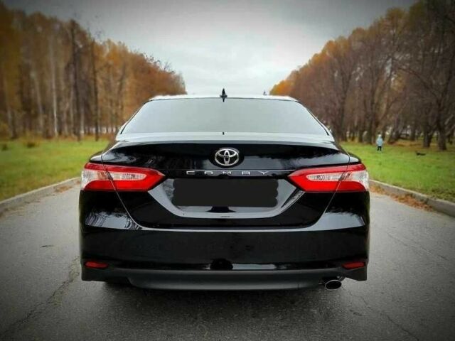 Черный Тойота Камри, объемом двигателя 2.5 л и пробегом 85 тыс. км за 21000 $, фото 1 на Automoto.ua