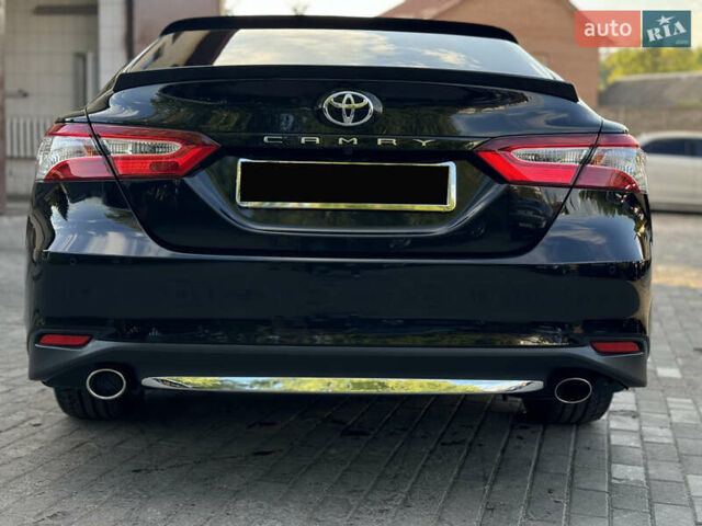 Черный Тойота Камри, объемом двигателя 2.5 л и пробегом 70 тыс. км за 31000 $, фото 7 на Automoto.ua