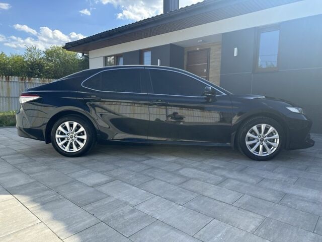 Черный Тойота Камри, объемом двигателя 2.5 л и пробегом 140 тыс. км за 20600 $, фото 1 на Automoto.ua