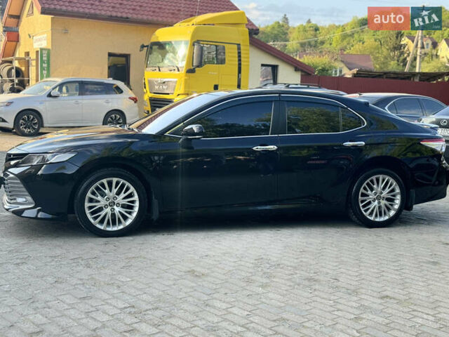 Черный Тойота Камри, объемом двигателя 2.5 л и пробегом 70 тыс. км за 31000 $, фото 38 на Automoto.ua