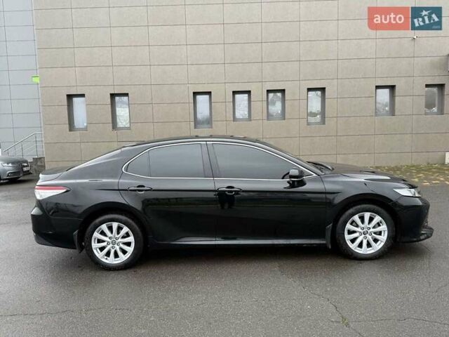 Черный Тойота Камри, объемом двигателя 2.5 л и пробегом 70 тыс. км за 20900 $, фото 1 на Automoto.ua