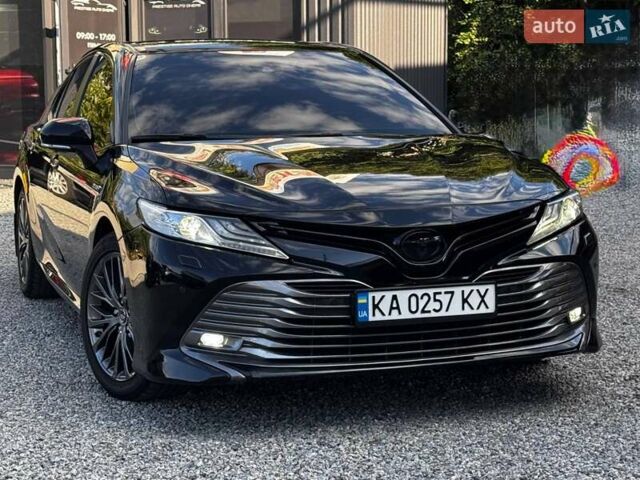 Черный Тойота Камри, объемом двигателя 2.49 л и пробегом 100 тыс. км за 26500 $, фото 1 на Automoto.ua