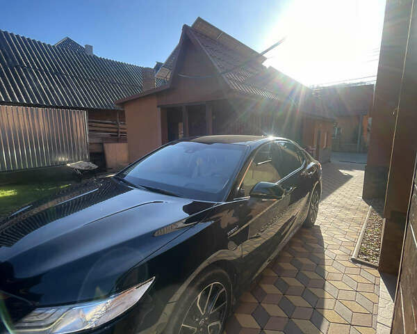 Чорний Тойота Камрі, об'ємом двигуна 2.5 л та пробігом 115 тис. км за 32000 $, фото 1 на Automoto.ua