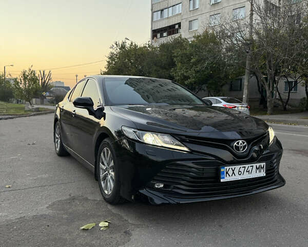 Черный Тойота Камри, объемом двигателя 2.49 л и пробегом 175 тыс. км за 21800 $, фото 1 на Automoto.ua