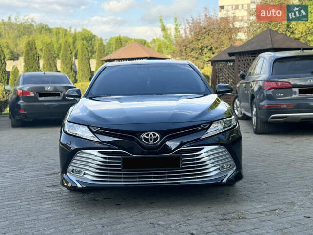 Черный Тойота Камри, объемом двигателя 2.5 л и пробегом 70 тыс. км за 31000 $, фото 32 на Automoto.ua