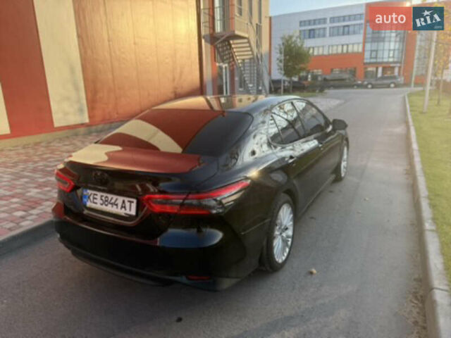 Чорний Тойота Камрі, об'ємом двигуна 2.49 л та пробігом 175 тис. км за 27000 $, фото 2 на Automoto.ua