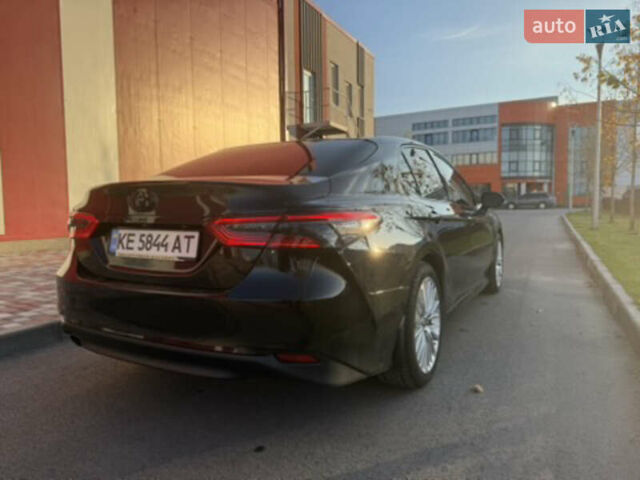 Чорний Тойота Камрі, об'ємом двигуна 2.49 л та пробігом 175 тис. км за 27000 $, фото 1 на Automoto.ua