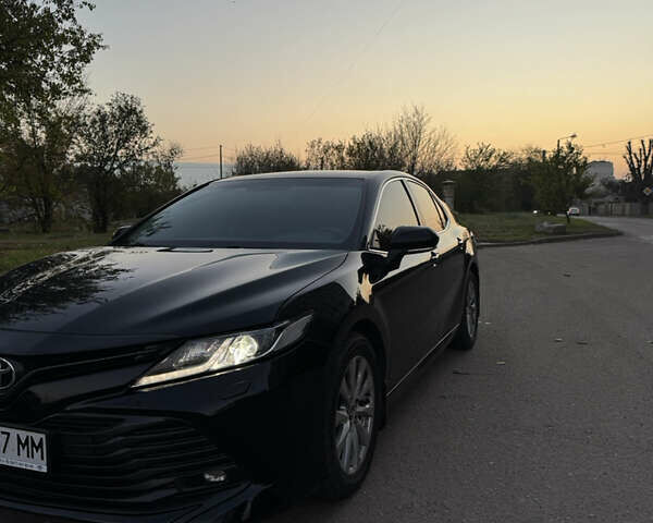 Черный Тойота Камри, объемом двигателя 2.49 л и пробегом 175 тыс. км за 21800 $, фото 2 на Automoto.ua