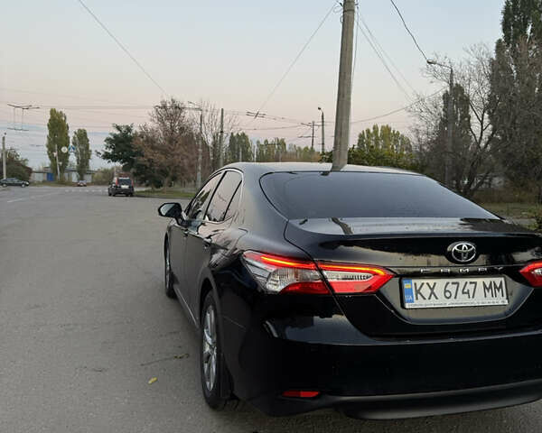 Черный Тойота Камри, объемом двигателя 2.49 л и пробегом 175 тыс. км за 21800 $, фото 3 на Automoto.ua