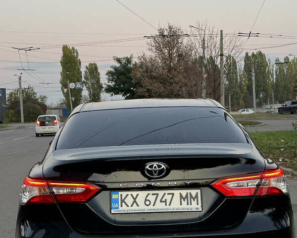 Черный Тойота Камри, объемом двигателя 2.49 л и пробегом 175 тыс. км за 21800 $, фото 4 на Automoto.ua