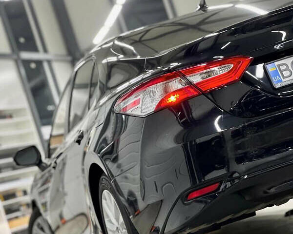 Черный Тойота Камри, объемом двигателя 2.49 л и пробегом 120 тыс. км за 21500 $, фото 1 на Automoto.ua