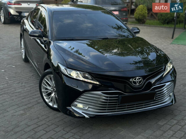 Черный Тойота Камри, объемом двигателя 2.5 л и пробегом 70 тыс. км за 31000 $, фото 42 на Automoto.ua