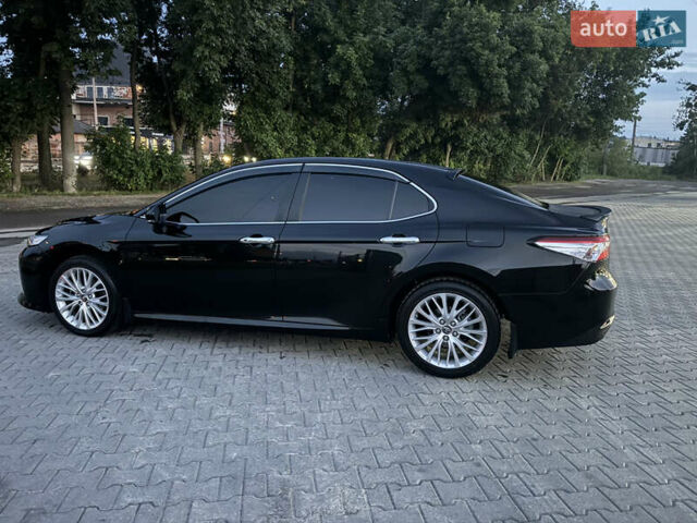 Черный Тойота Камри, объемом двигателя 2.5 л и пробегом 70 тыс. км за 31000 $, фото 57 на Automoto.ua
