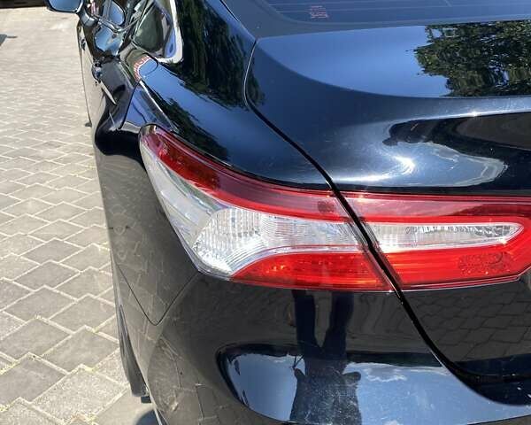 Чорний Тойота Камрі, об'ємом двигуна 2.49 л та пробігом 133 тис. км за 24000 $, фото 2 на Automoto.ua