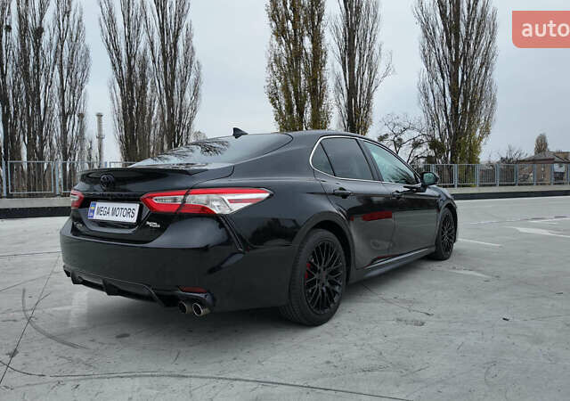 Чорний Тойота Камрі, об'ємом двигуна 2.49 л та пробігом 185 тис. км за 18990 $, фото 1 на Automoto.ua
