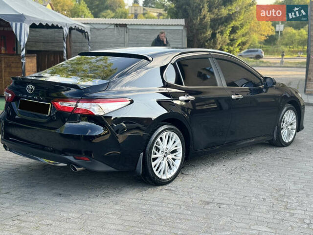 Черный Тойота Камри, объемом двигателя 2.5 л и пробегом 70 тыс. км за 31000 $, фото 35 на Automoto.ua