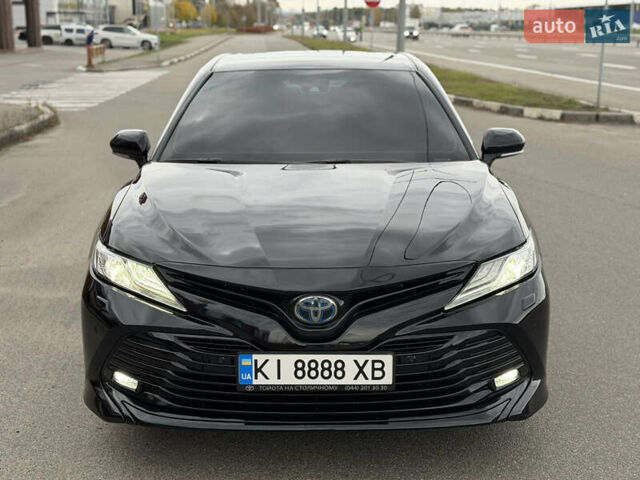Черный Тойота Камри, объемом двигателя 2.49 л и пробегом 143 тыс. км за 27500 $, фото 1 на Automoto.ua