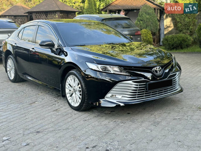 Черный Тойота Камри, объемом двигателя 2.5 л и пробегом 70 тыс. км за 31000 $, фото 33 на Automoto.ua