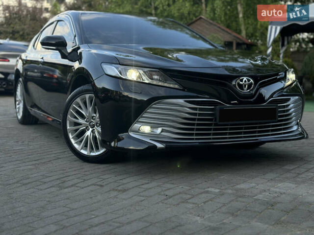 Черный Тойота Камри, объемом двигателя 2.5 л и пробегом 70 тыс. км за 31000 $, фото 5 на Automoto.ua