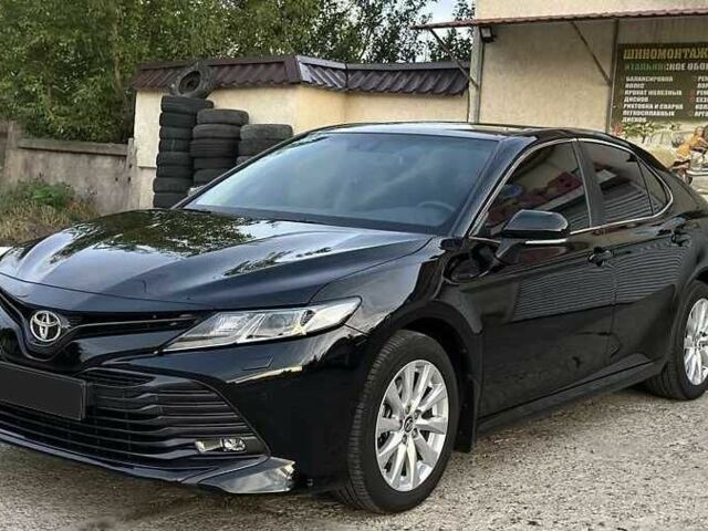 Черный Тойота Камри, объемом двигателя 2.5 л и пробегом 117 тыс. км за 17600 $, фото 7 на Automoto.ua