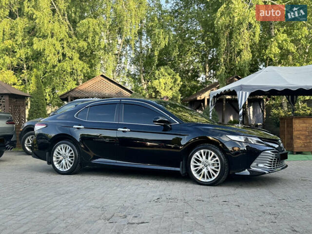 Черный Тойота Камри, объемом двигателя 2.5 л и пробегом 70 тыс. км за 31000 $, фото 34 на Automoto.ua