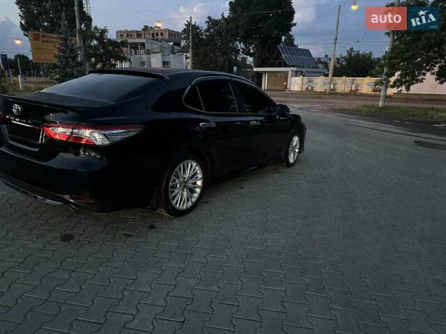 Черный Тойота Камри, объемом двигателя 2.5 л и пробегом 70 тыс. км за 31000 $, фото 56 на Automoto.ua