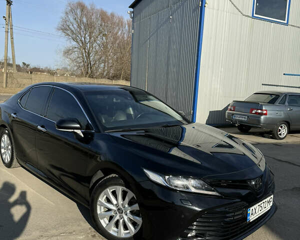 Черный Тойота Камри, объемом двигателя 2.49 л и пробегом 156 тыс. км за 24000 $, фото 1 на Automoto.ua