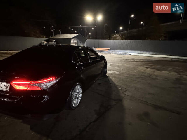 Черный Тойота Камри, объемом двигателя 2.49 л и пробегом 125 тыс. км за 29300 $, фото 1 на Automoto.ua